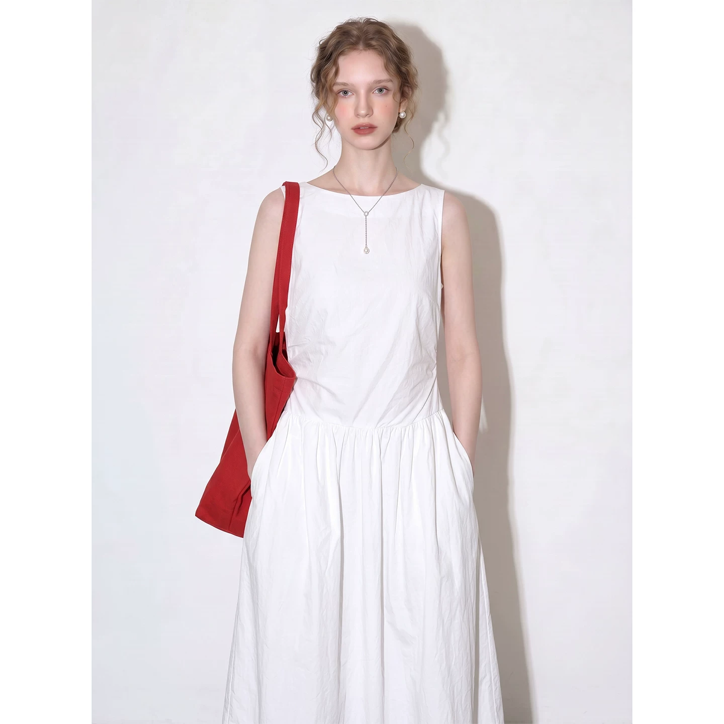 White sleeveless dress for women 2026 summer new niche design waist slimming A-line long skirt pure white style White sleeveless dress for women 2026 summer new niche design waist slimming A-line long skirt pure white style